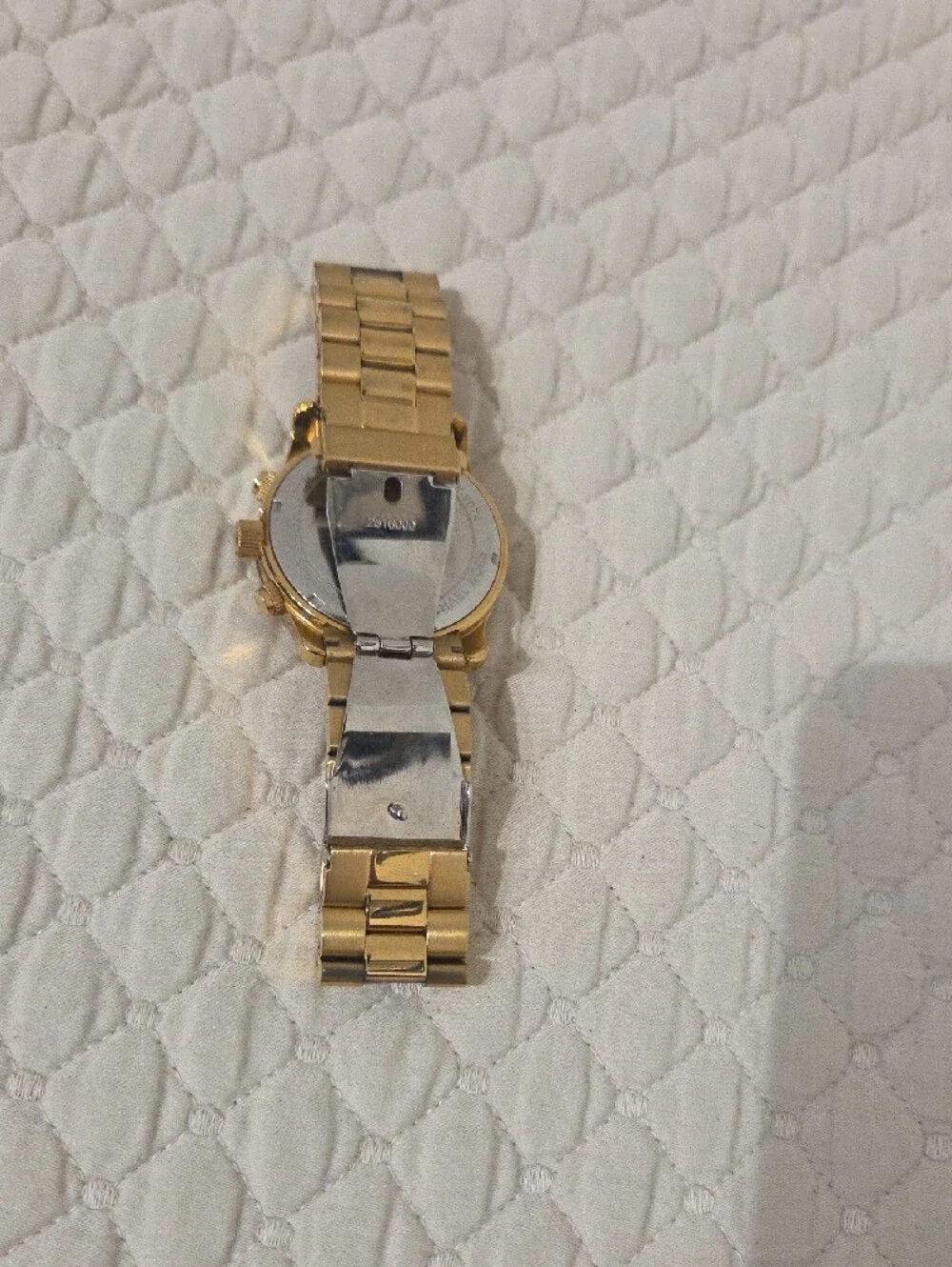 Michael Kors gold tone